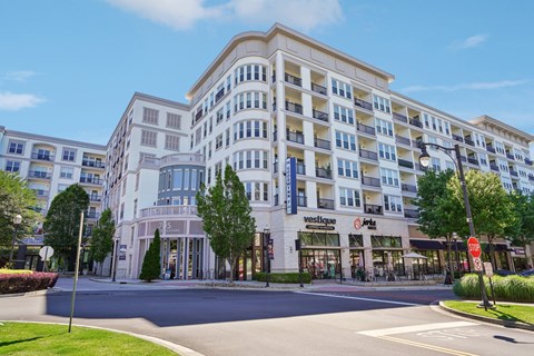 A large white building with the word "vestige" on it.