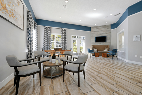 A living room with a grey sofa and a coffee table.