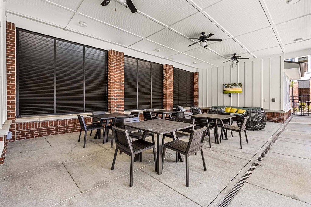 A patio with a table and chairs is shown.