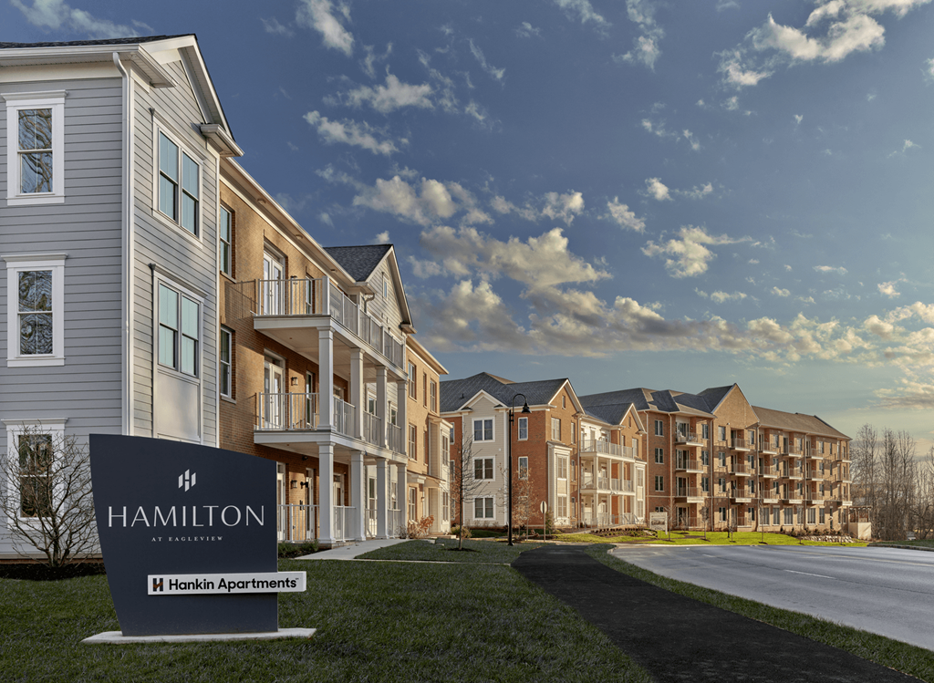 The Hamilton at Eagleview sign stands proudly in front of the apartment buildings, welcoming residents to the community in Exton, PA