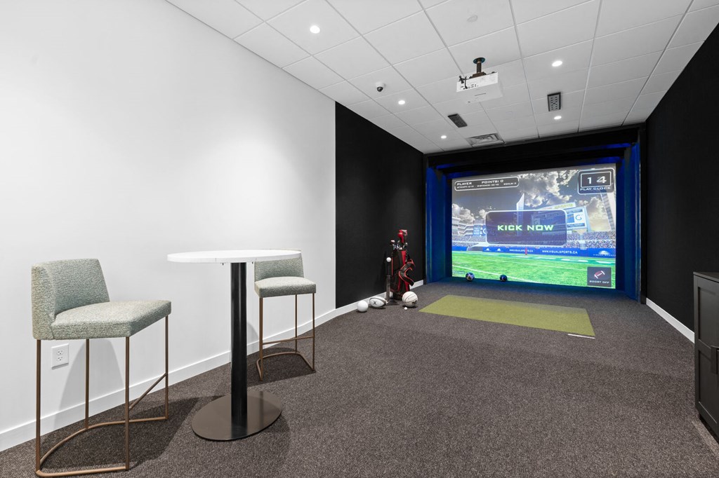 Multi-sport golf simulator room at Hamilton at Eagleview, offering entertainment and recreation in Exton, PA 19341