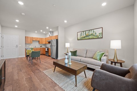 a living room with a couch and a table