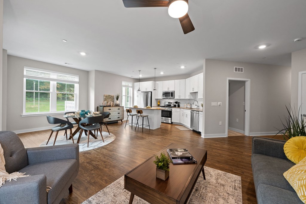 Cozy living room with a comfortable couch, stylish table, and modern finishes at Hamilton at Eagleview, Exton, PA 19341
