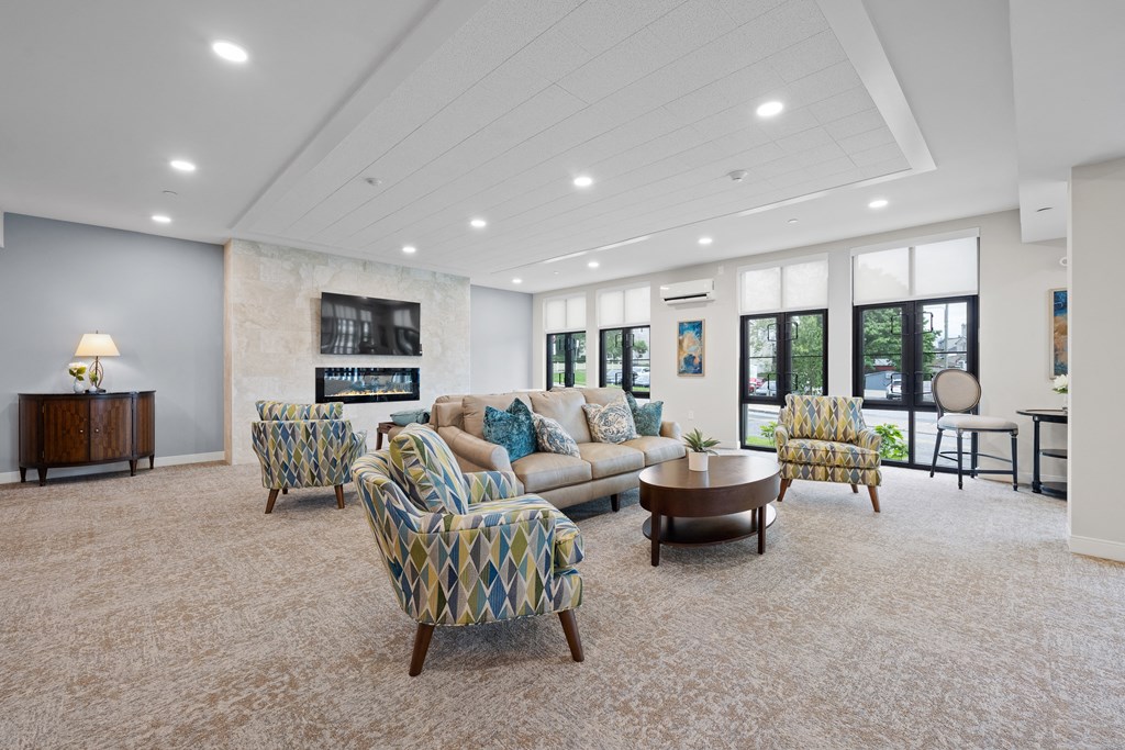 community room with couches and chairs