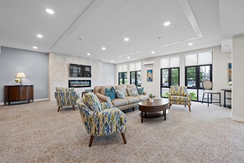 community room with couches and chairs