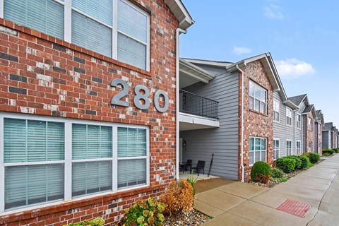 A row of houses with the number 280 on the front.