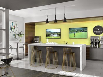 Lobby coffee bar with seating and two televisions - Photo Gallery 6