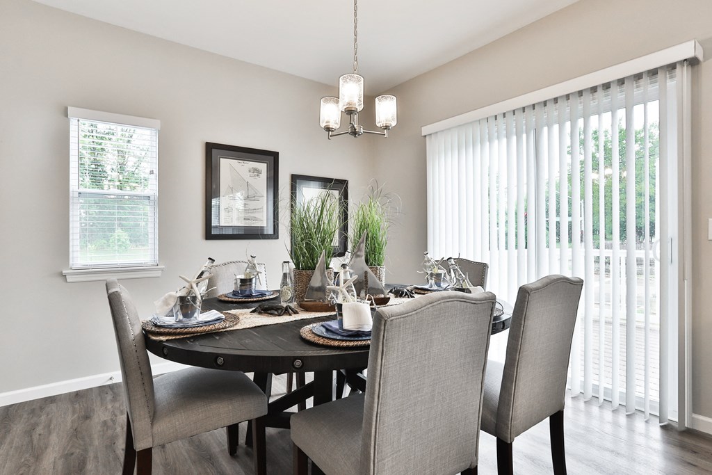 the gathering room of a home with a dining table