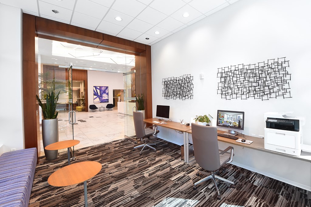 business center with two computers at Two Twelve Clayton, Missouri