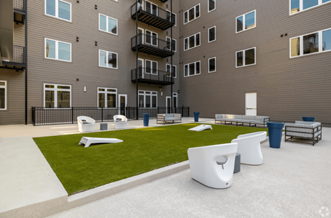 an outdoor lounge area at the bradley braddock road station apartments at 2200 LaSalle, St Louis, MO, 63104