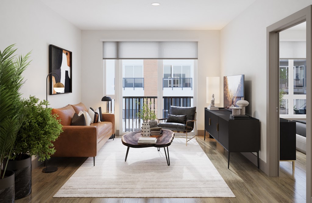 a living room with a couch and a table at Bemiston Place Apartments, Clayton