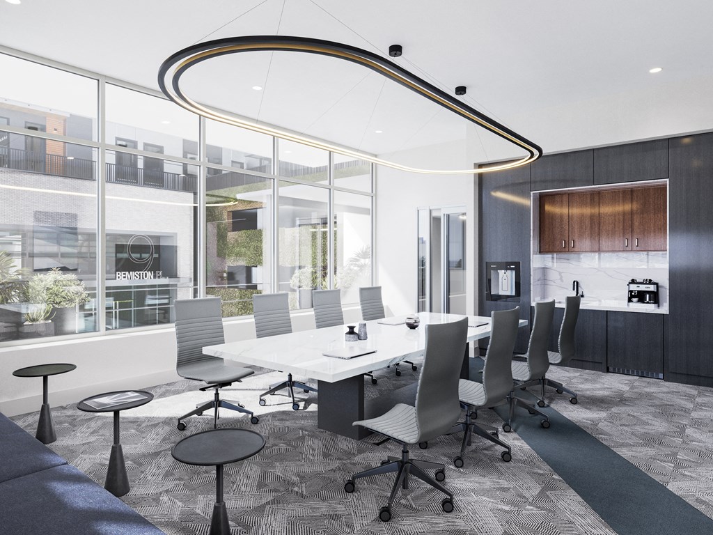 a conference room with a white table and chairs at Bemiston Place Apartments, Missouri, 63105