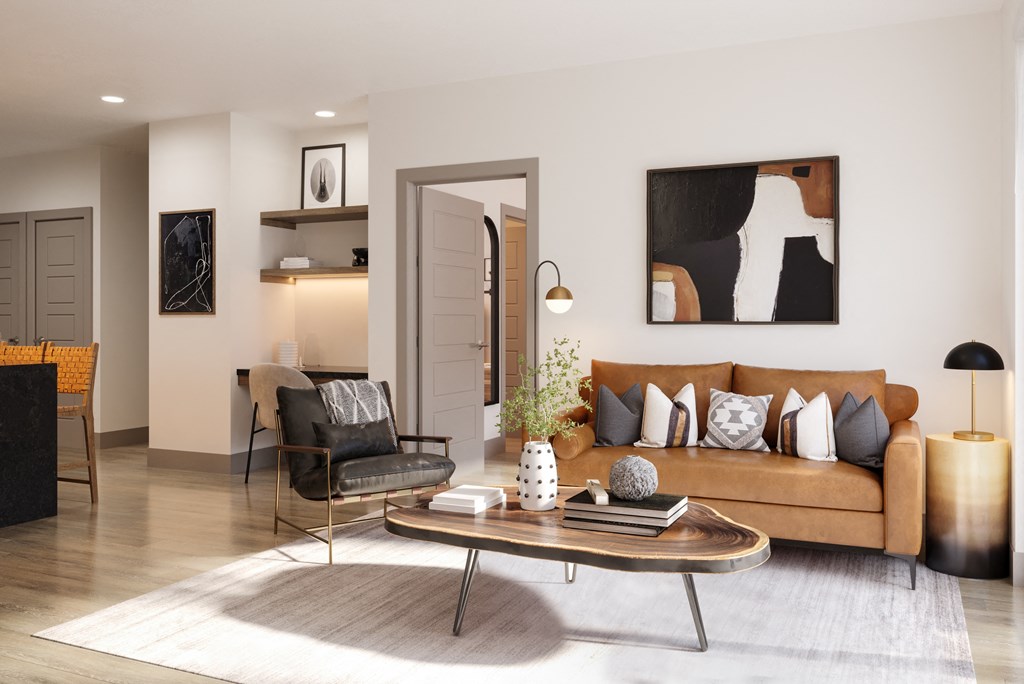 a living room with a brown couch and a coffee table at Bemiston Place Apartments, Clayton