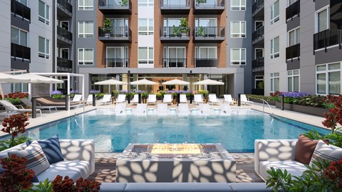 a swimming pool in front of an apartment building a swimming pool in front of an apartment building at Bemiston Place Apartments, Clayton, 63105
