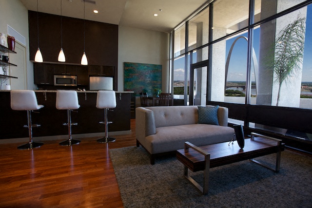 a living room with a couch and a table