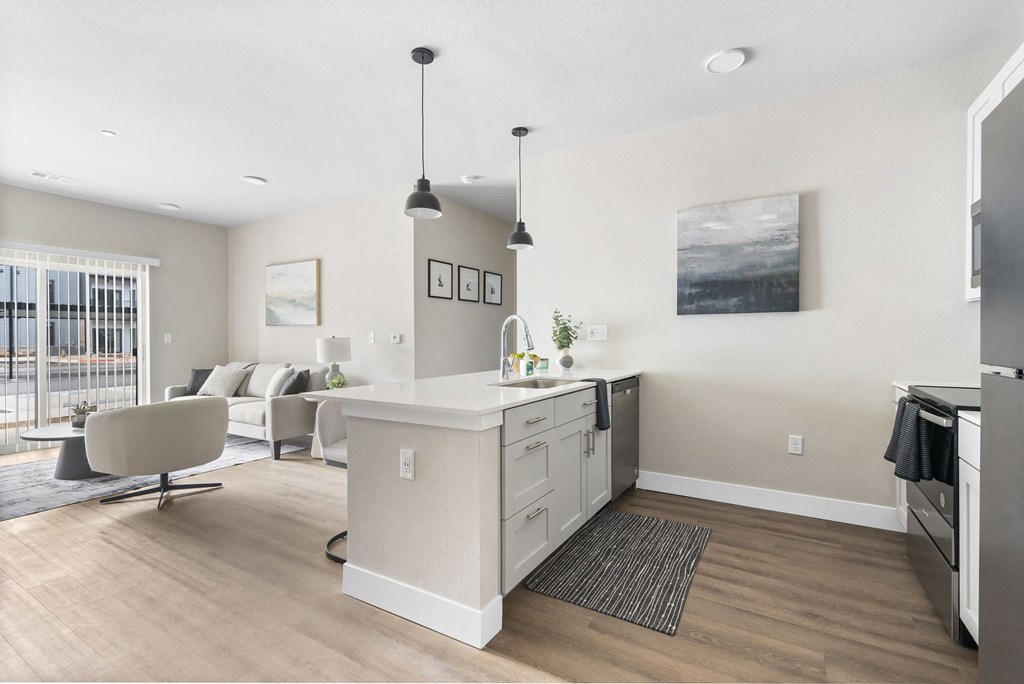 Open kitchen and living room at The Junction at Rogers, AR, 72756