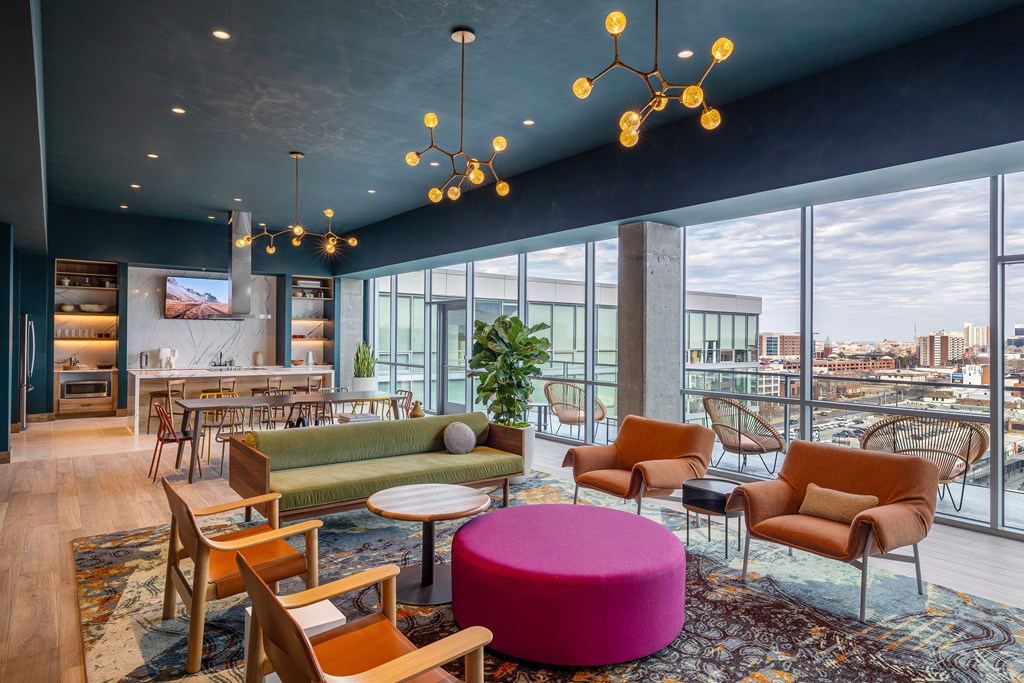 A modern living room with a view of the city.