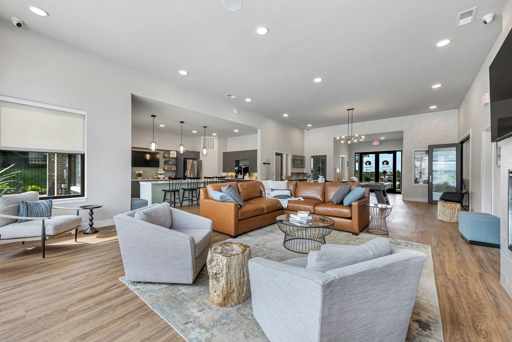 Modern clubroom with conversational seating at The Prairie Villas, Dardenne Prairie, 63368