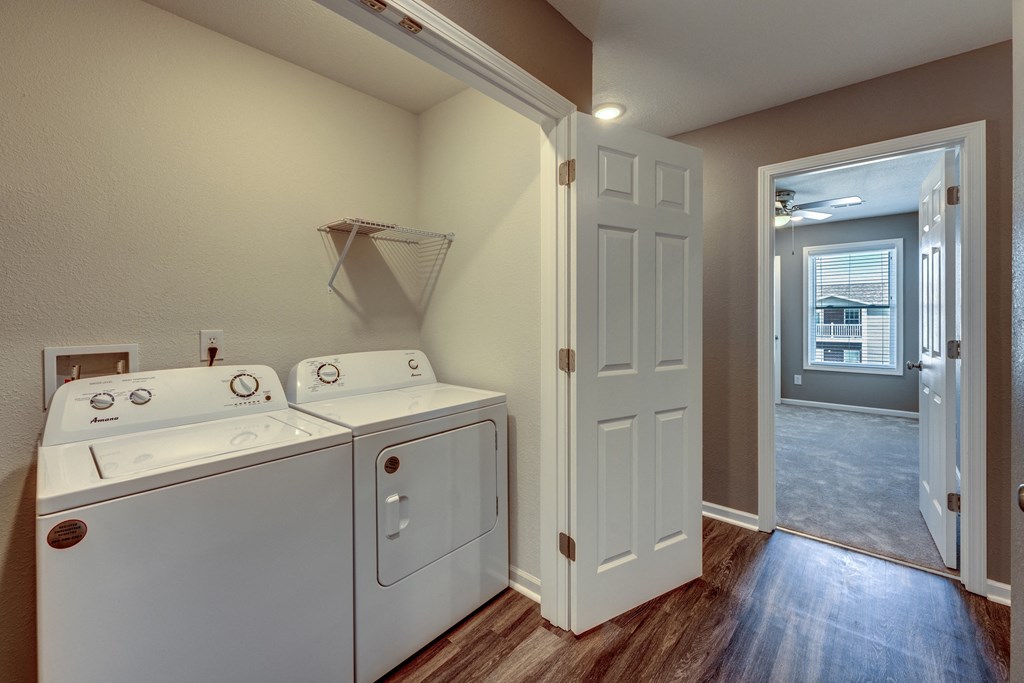 A laundry room with a washer and dryer.