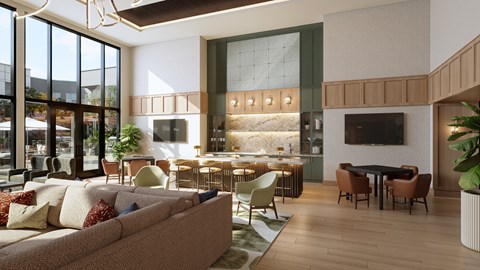 A modern living room with a large couch and a television.
