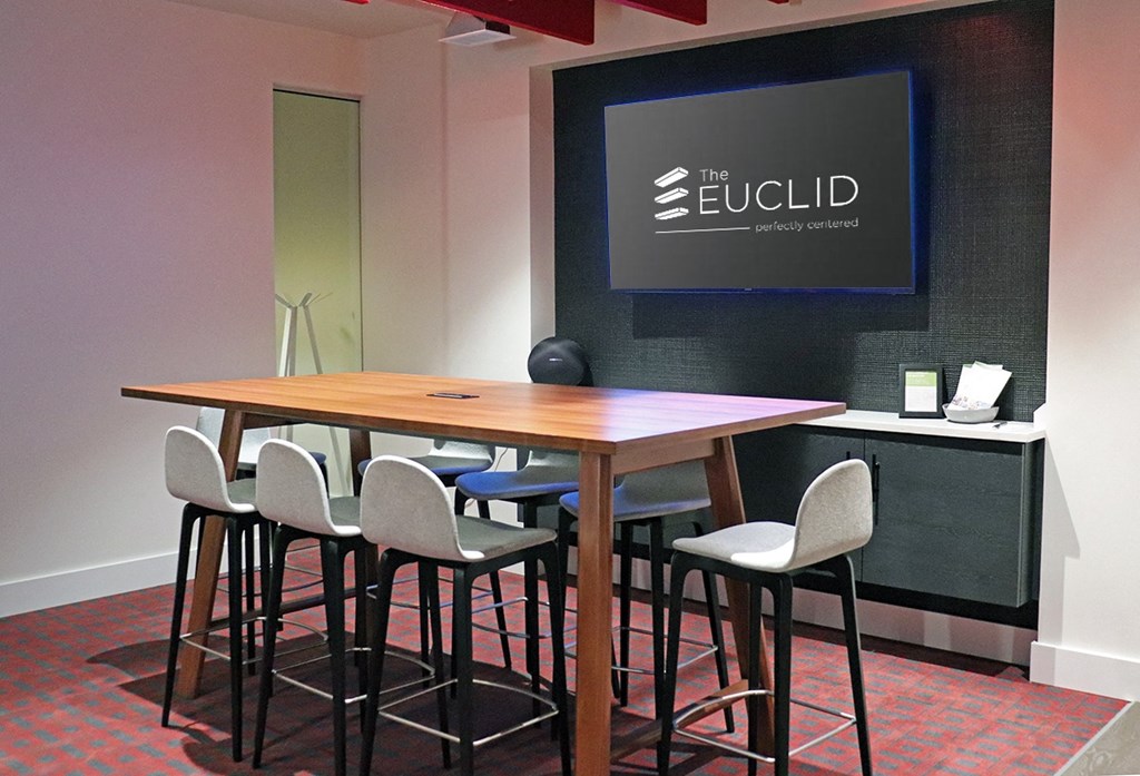 Leasing office conference table with TV at The Euclid, St Louis, MO