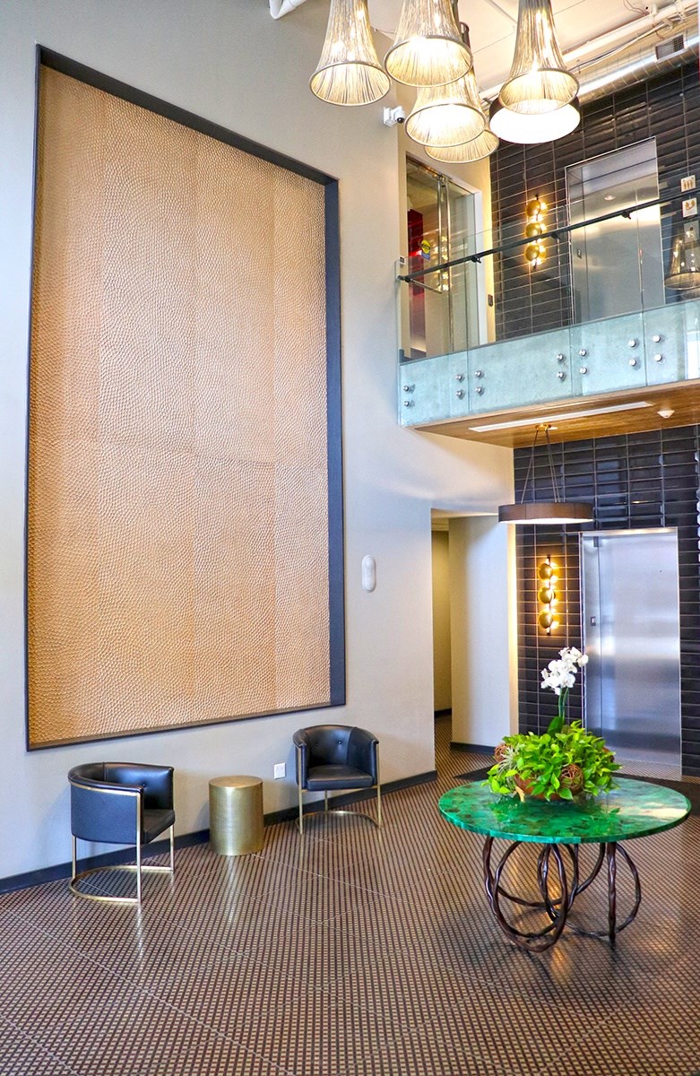 Lobby with seating and elevators at The Euclid, Missouri, 63108