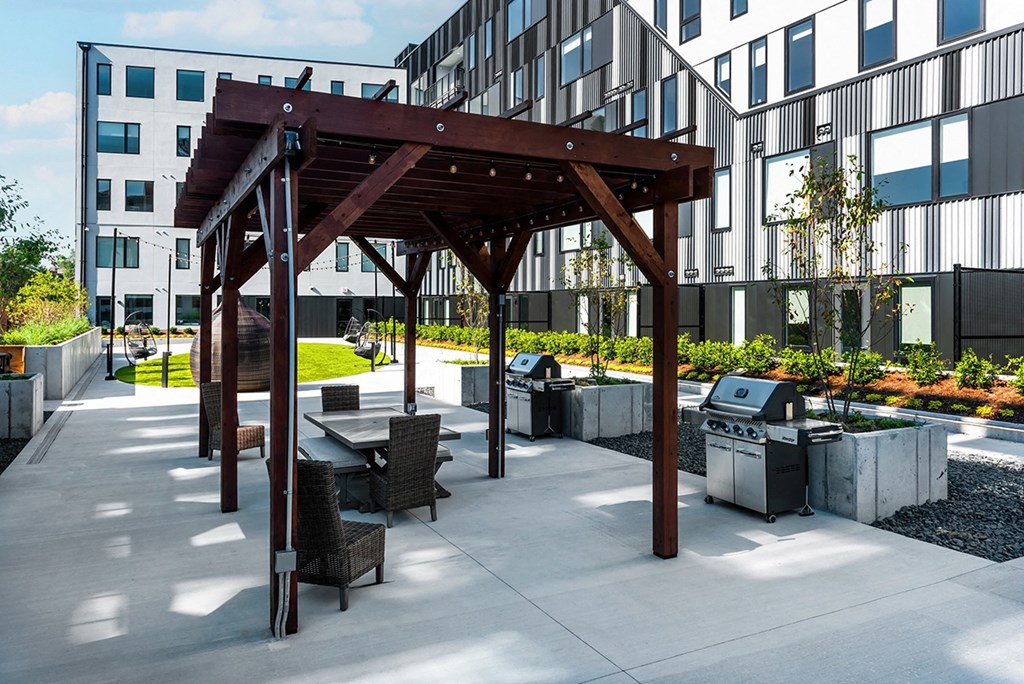 Steelcote Flats grilling stations and pergola with seating at Steelcote Square, St. Louis