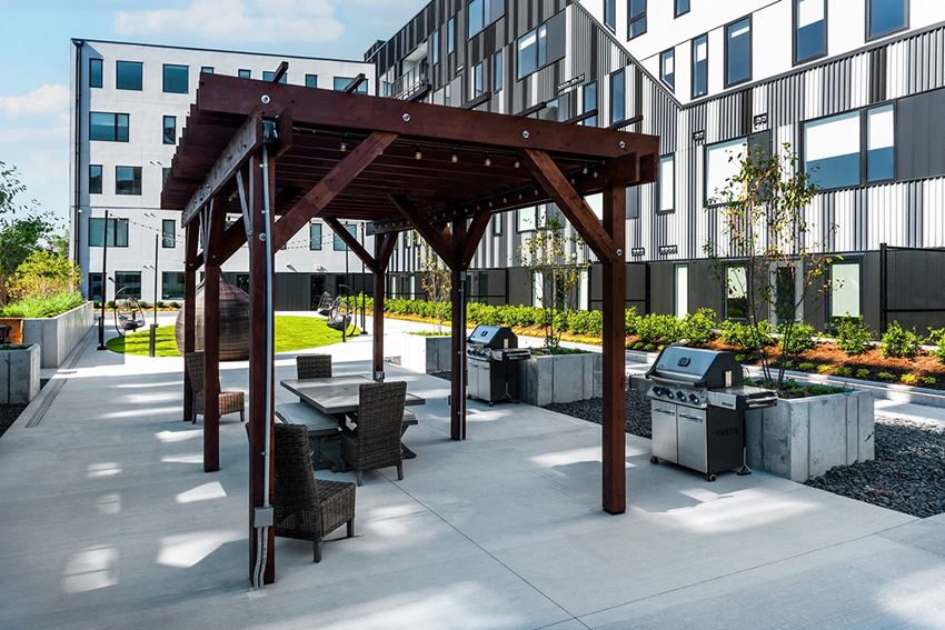 Steelcote Flats grilling stations and pergola with seating - Photo Gallery