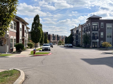 Residential street view with and landscaping at GrandView Flats and Townhomes Apartments, Indiana, 46530