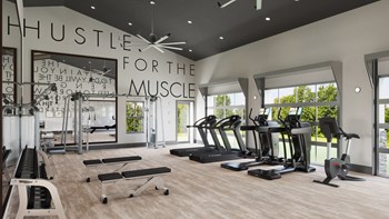 Fitness Center with Treadmills, White Ceiling Fans, Light Wood Grain Vinyl Flooring - Photo Gallery 5