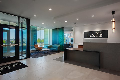 a modern hotel lobby with a pool in the background  at 2200 LaSalle, St Louis, MO
