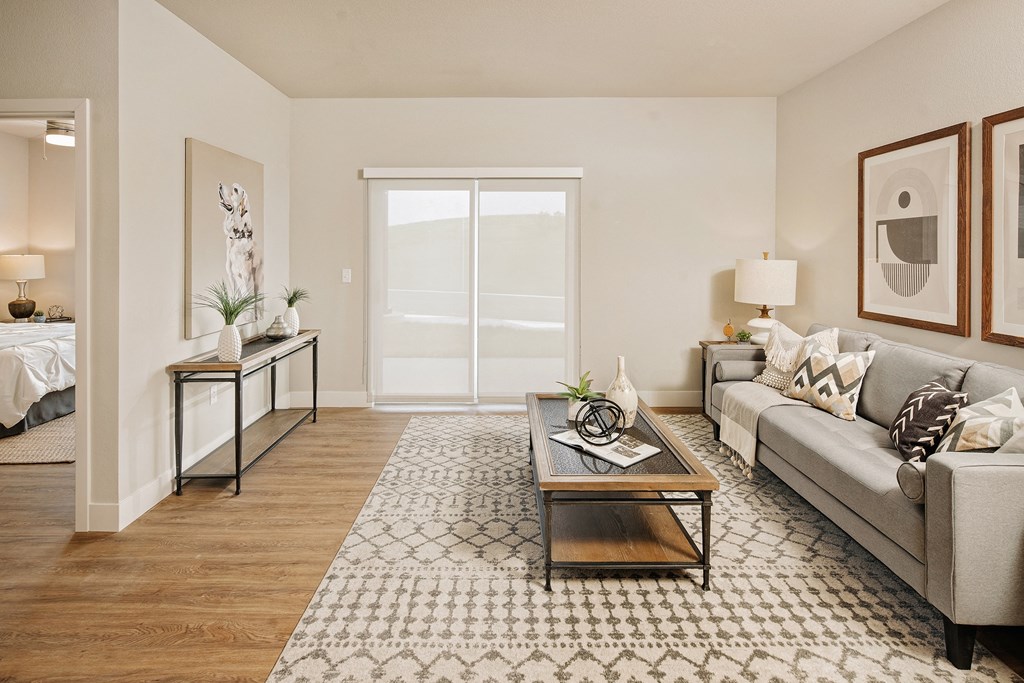 a living room with a couch and a coffee table at 44 West Luxury Living, Valley Park, Missouri