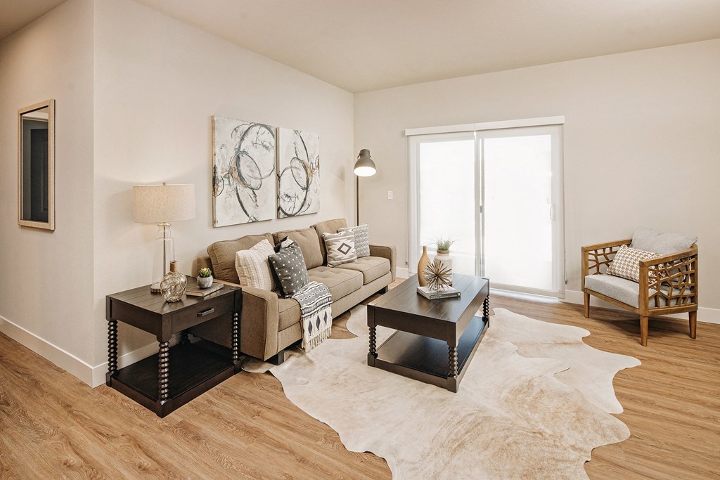 a living room with a couch and a table at 44 West Luxury Living, Missouri, 63088
