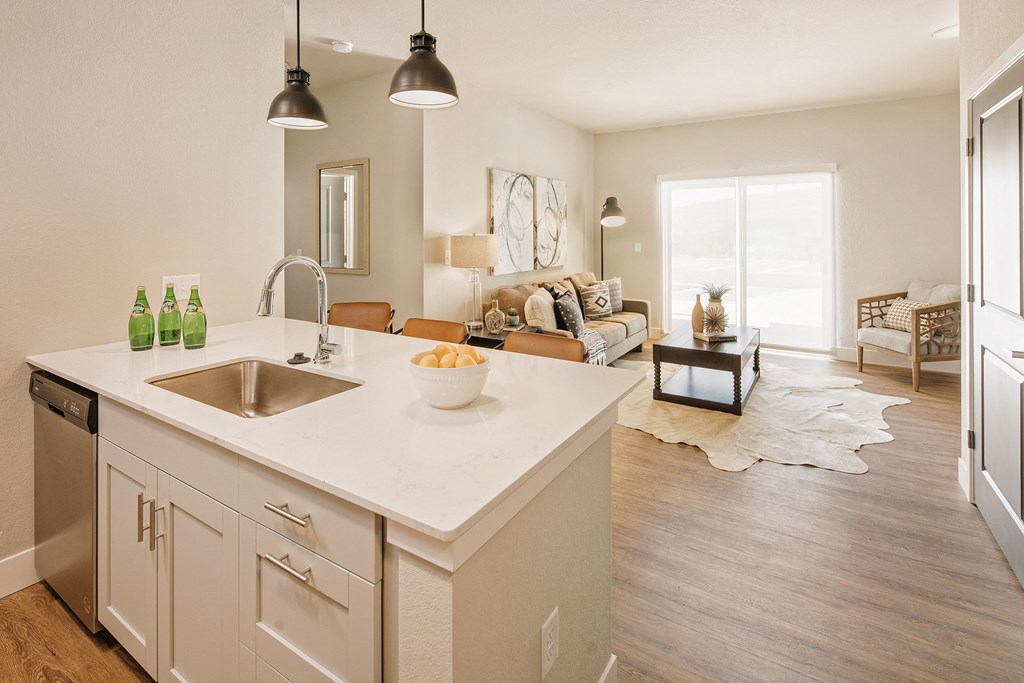 an open floor plan with a kitchen and living room at 44 West Luxury Living, Valley Park, MO