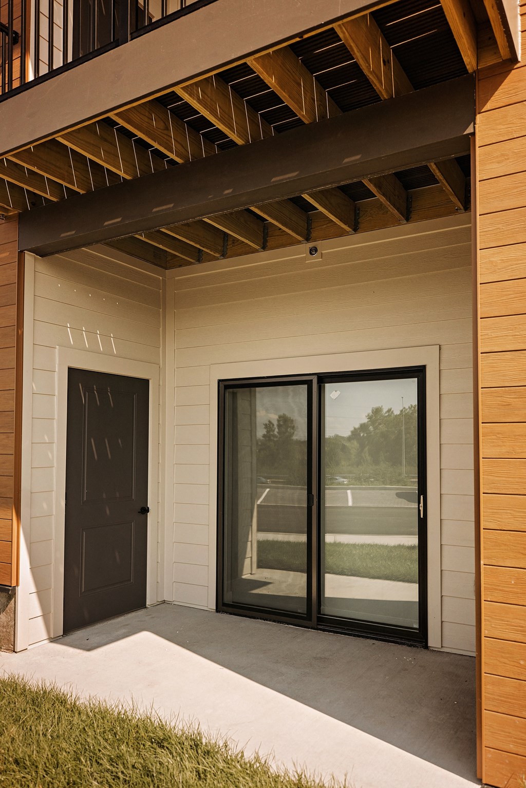 Patio with sliding glass door and extra storage at 44 West Luxury Living, Valley Park, MO, 63088