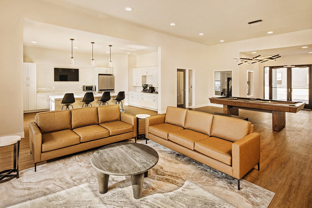 a large living room with couches and at 44 West Luxury Living, Missouri