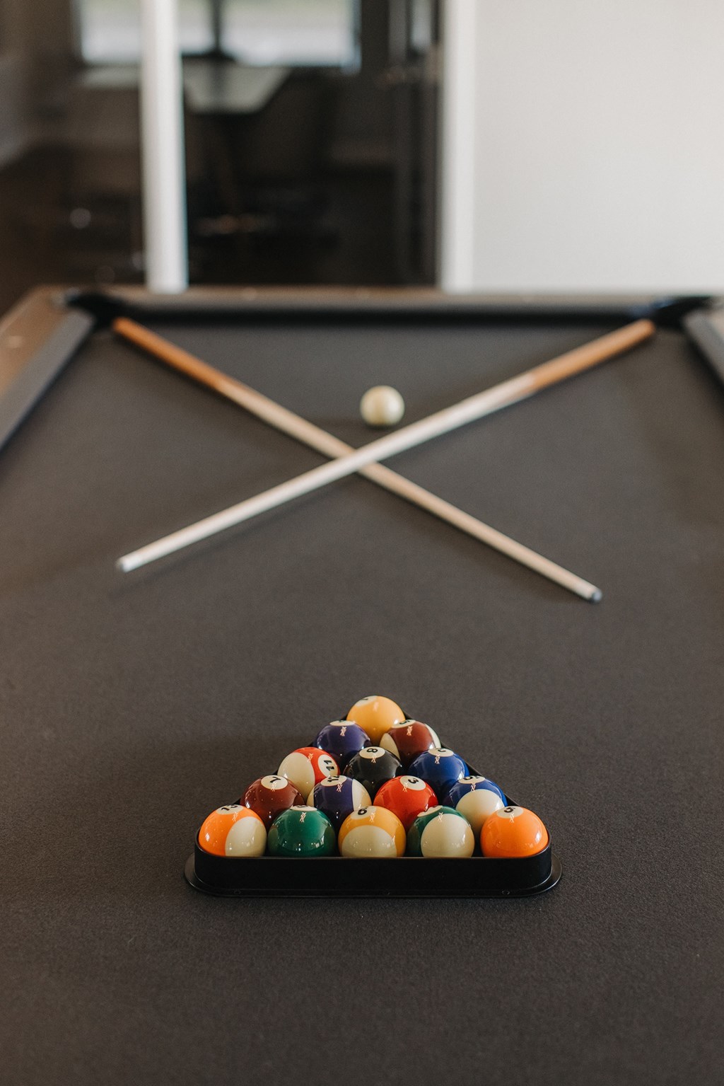 a pool table with billiard balls and sticks a pool table with billiard balls and sticks at 44 West Luxury Living, Missouri, 63088