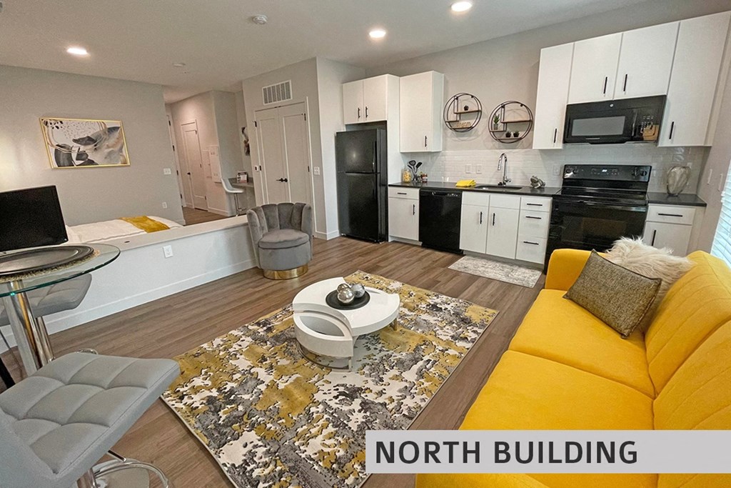 a kitchen and living room in a north building  at Expo at Forest Park, St. Louis, MO