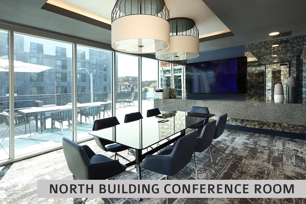 a conference room with a glass table and chairs and the words north building conference room at Expo at Forest Park, St. Louis, MO, 63112