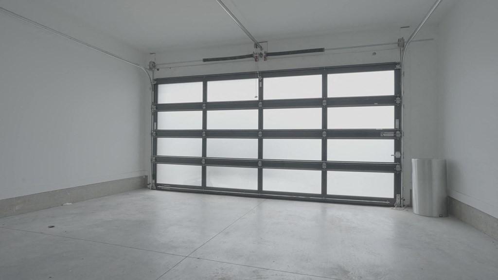 an empty room with a garage door