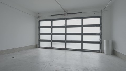 an empty room with a garage door