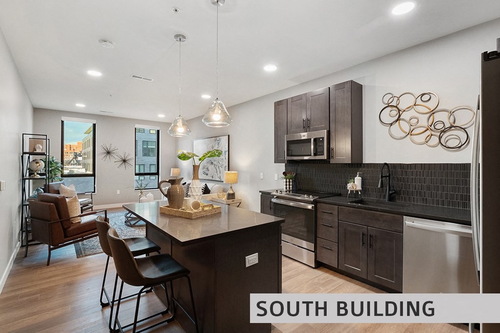 a kitchen and living room in a south building  at Expo at Forest Park, St. Louis