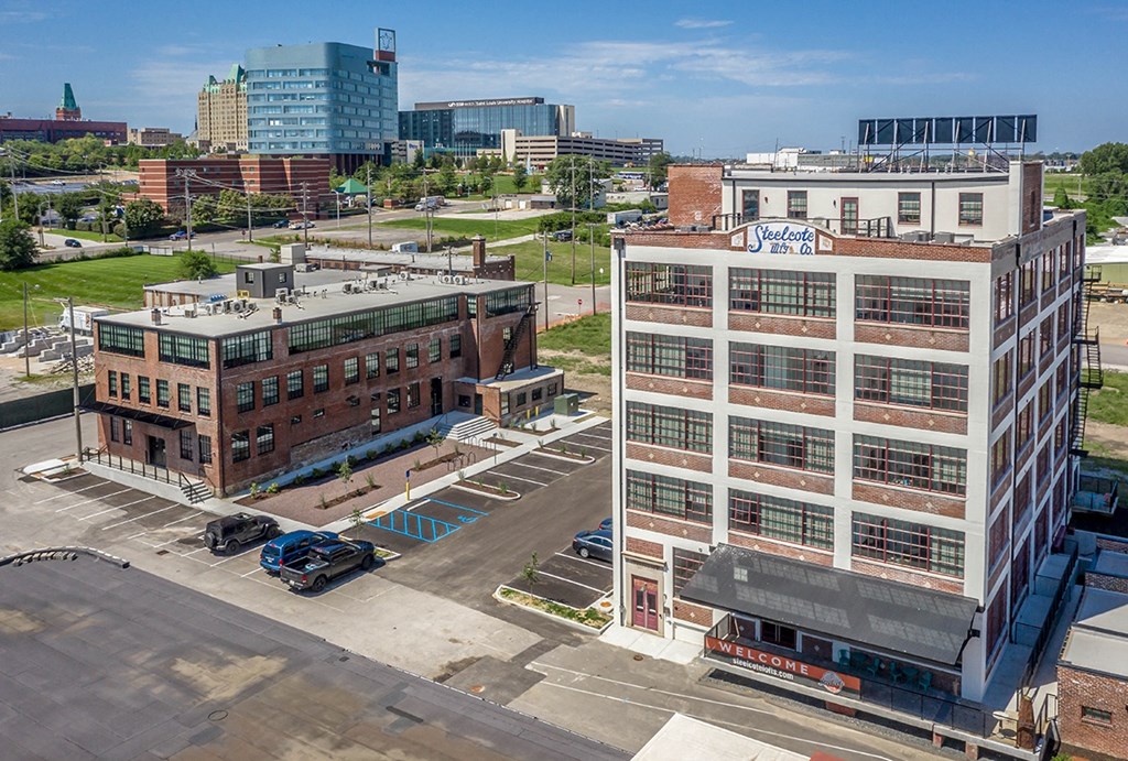 an aerial view of a building in the city