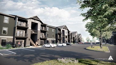 Exterior of 3 Story Apartment Building and Parking Lot