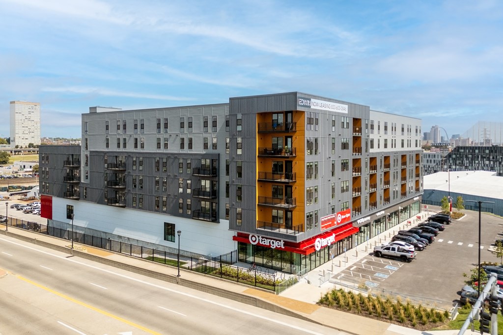 an aerial view of an apartment building and a parking lot at The Edwin on Grand Apartments, Missouri, 63103