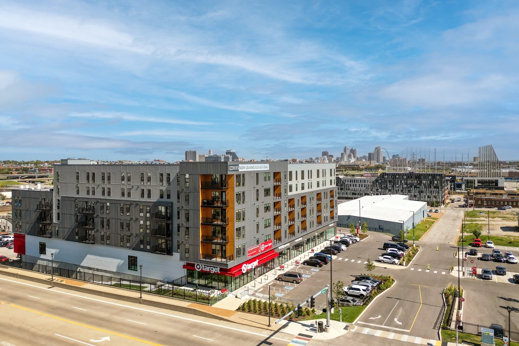 an aerial view of an apartment building and a parking lot at The Edwin on Grand Apartments, St Louis