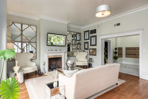 A living room with a fireplace and a couch.