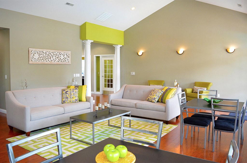 clubhouse with green wall and white furniture at Villas At Crystal Lake, Illinois, 62226