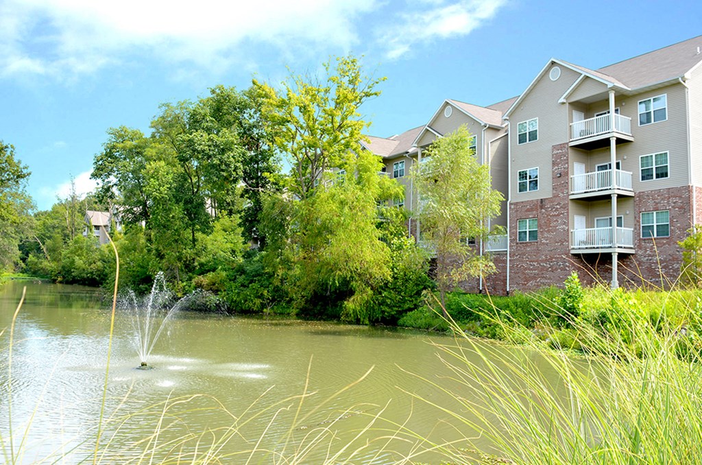 lake with fountain and buildings in distance at Villas At Crystal Lake, Swansea, IL, 62226