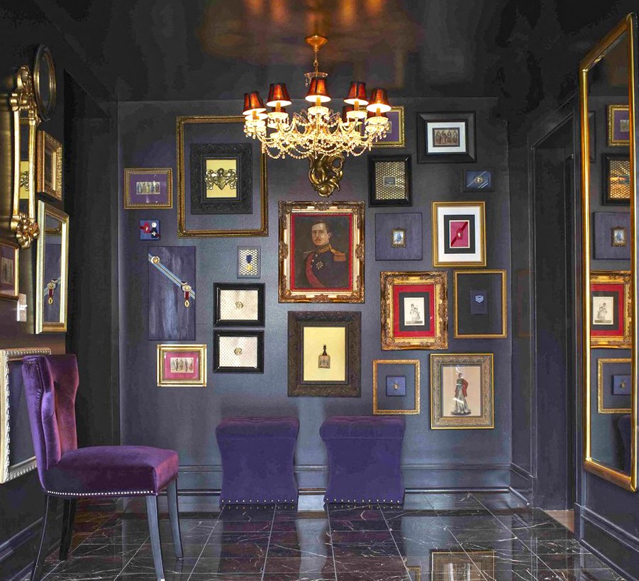 York House library bar decor, dark wall with artwork at York House, Saint Louis